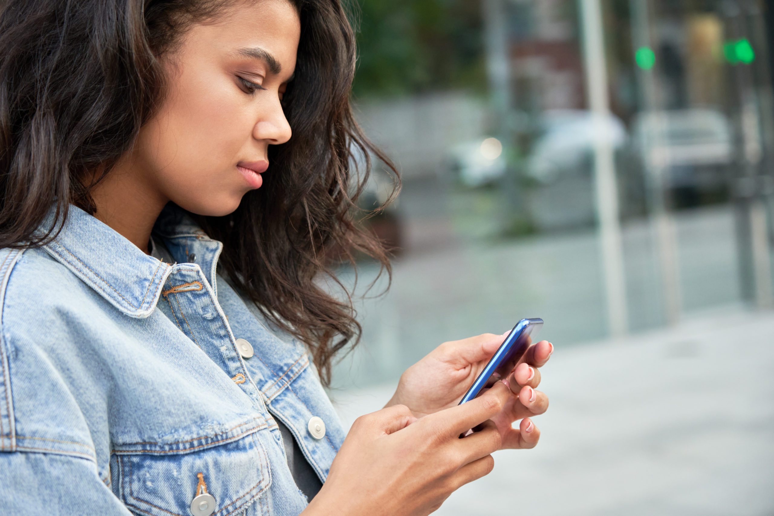 Young African American Teen Hipster Girl Standing On Urban City